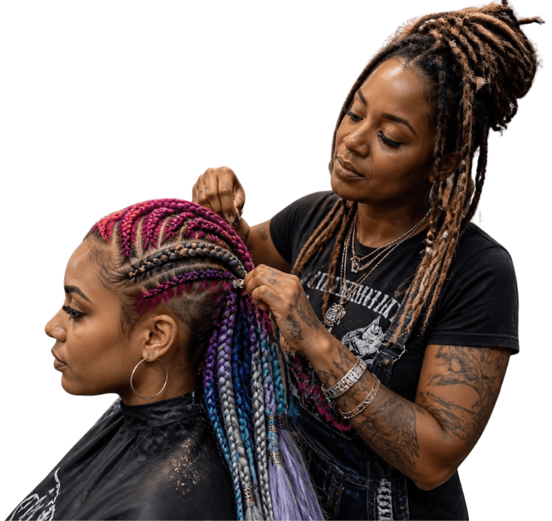 Stylist braiding a client's hair