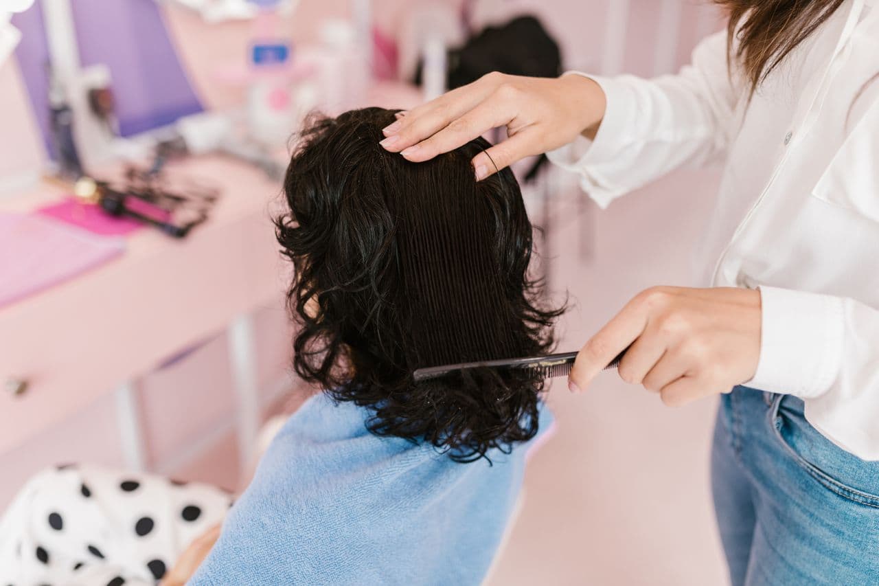 Stylist working on a wig